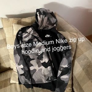 Boys Medium zip up hoodie and jogger set.
